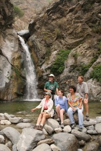 Practicing waterfall safety. Trailmaster John McKinney (top R) has led hikes to lovely Eaton Canyon Falls, which should not be climbed but safely admired from the pretty pool at the bottom.