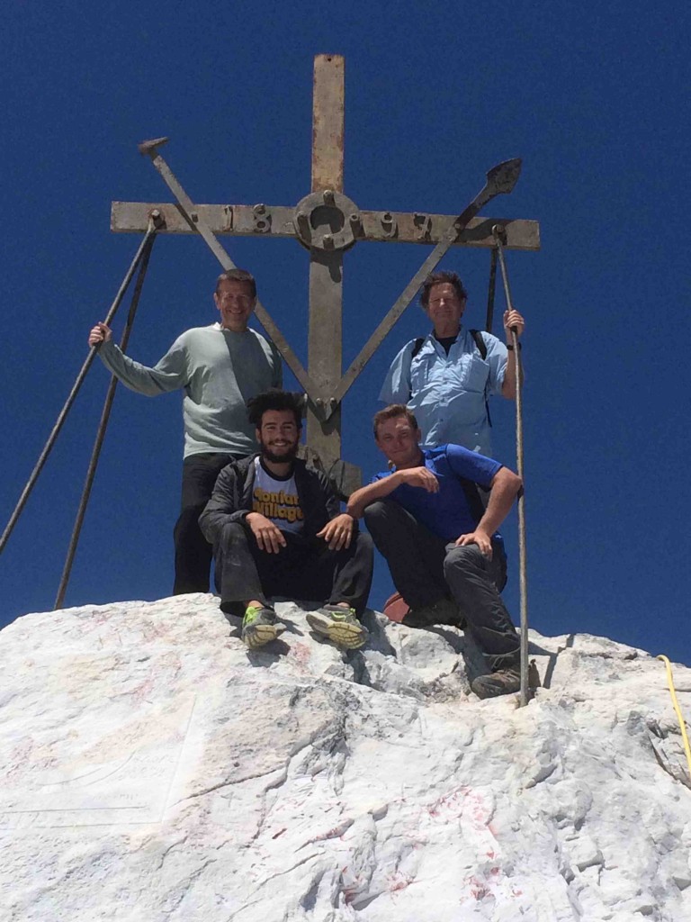 Atop Athos is an iron cross, where we four pilgrims are all smiles after our long climb: (L-R) Spiro Deligiannis, John McKinney, Zachary Deligiannis and Daniel McKinney.